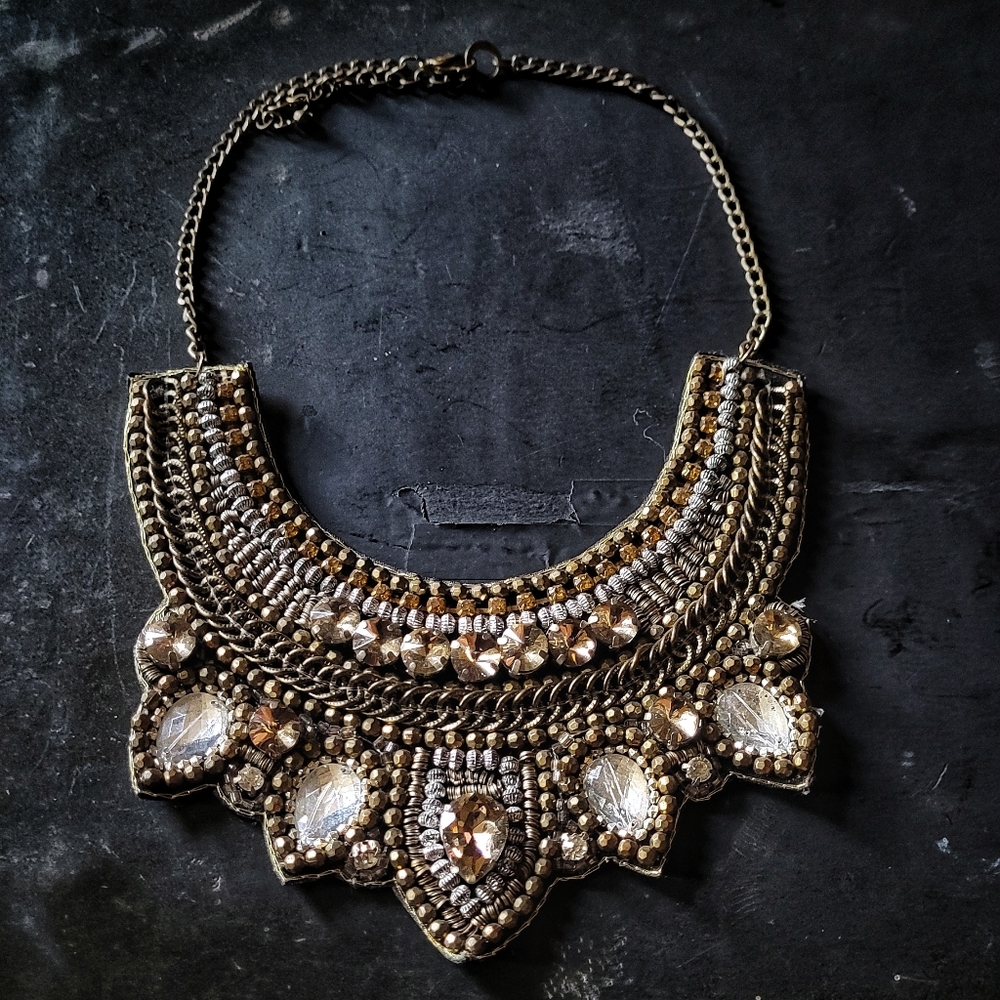 Amazingly gorgeous bibbed gold and silver gemstone inspired beaded necklace.